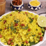 Poha Recipe: अगर आप भी नाश्ते में कुछ पौष्टिक आहार लेना चाहते हैं तो ऐसे बनाएं पोहे की आसान रेसिपी